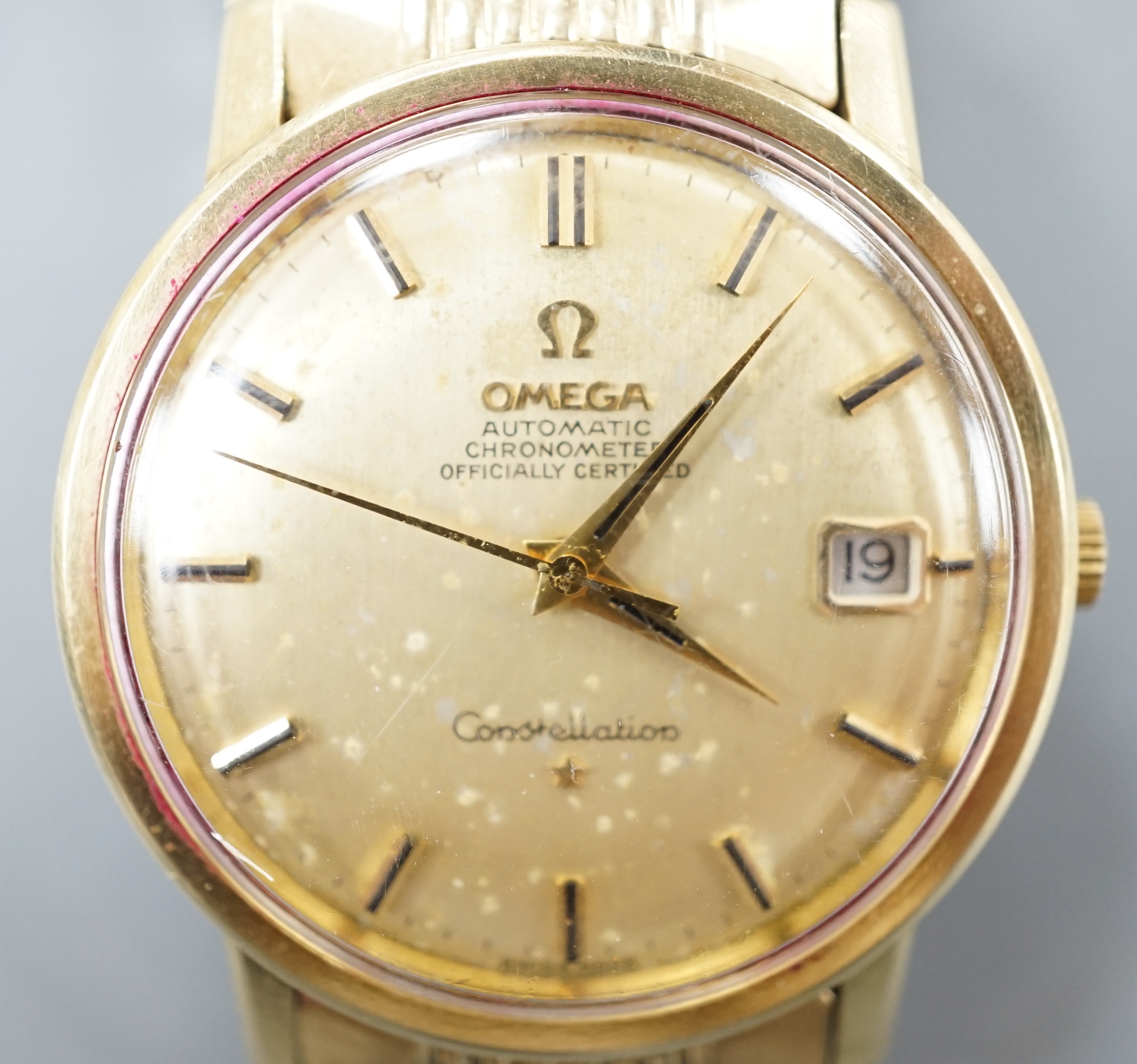 A gentleman's steel and gold plated Omega constellation automatic wrist watch, on an Omega gold plated bracelet.